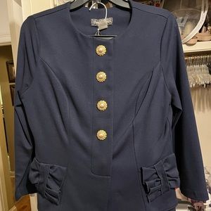 Navy blue suit jacket, skirt, scarf, and hat